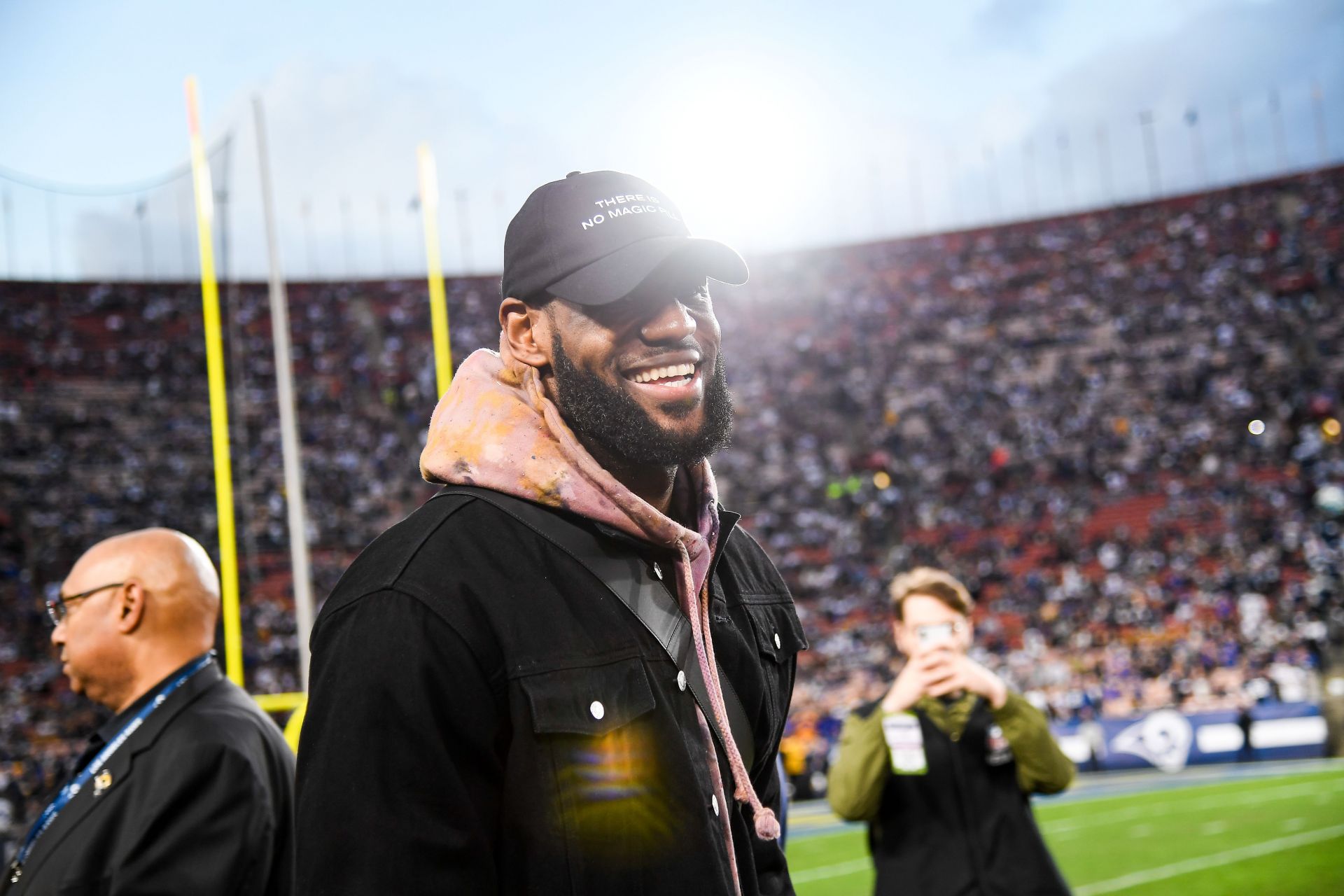 LeBron James takes in the NFL game between the LA Rams and the Dallas Cowboys.