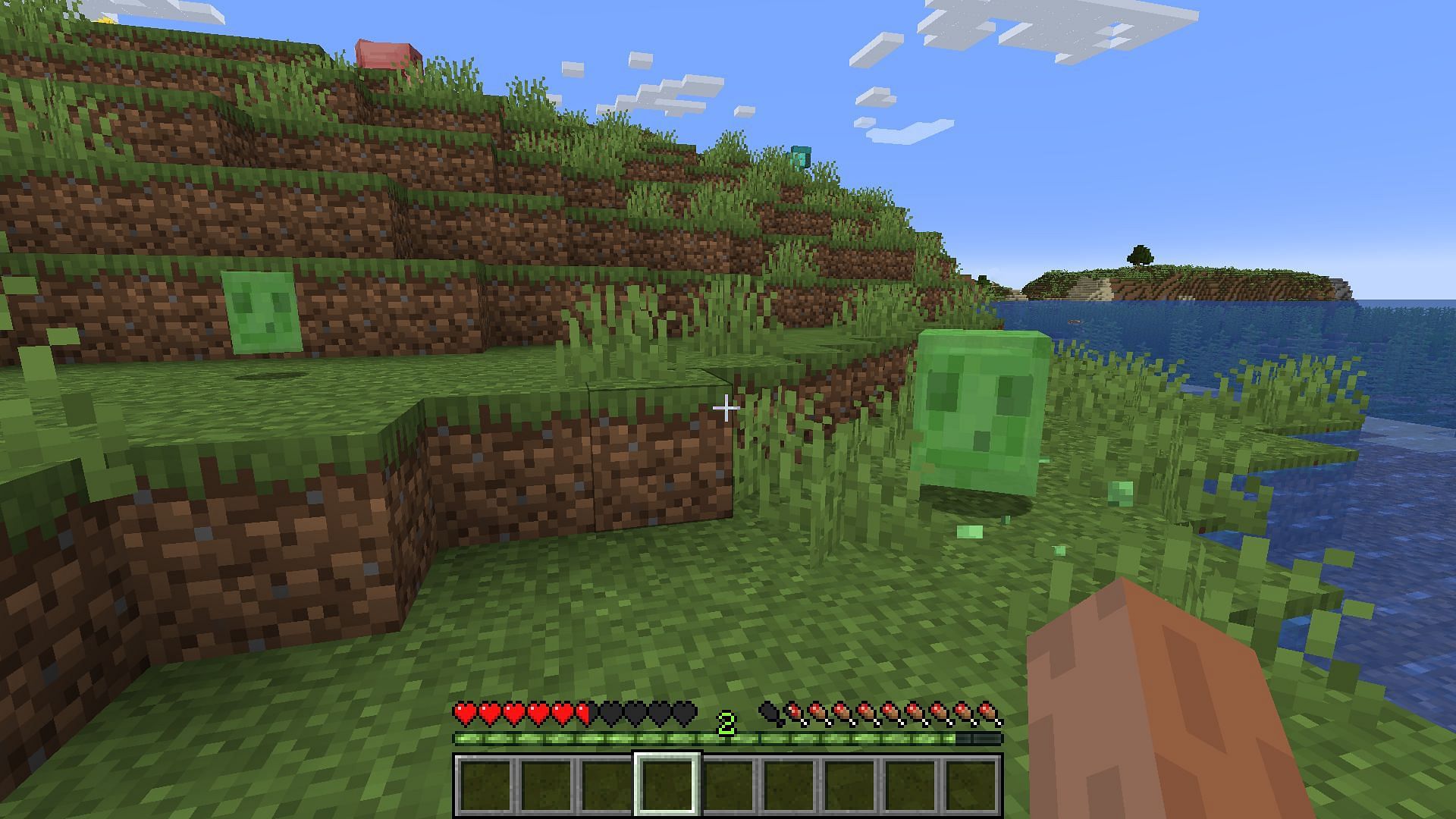 Slimes home in on a player (Image via Minecraft)