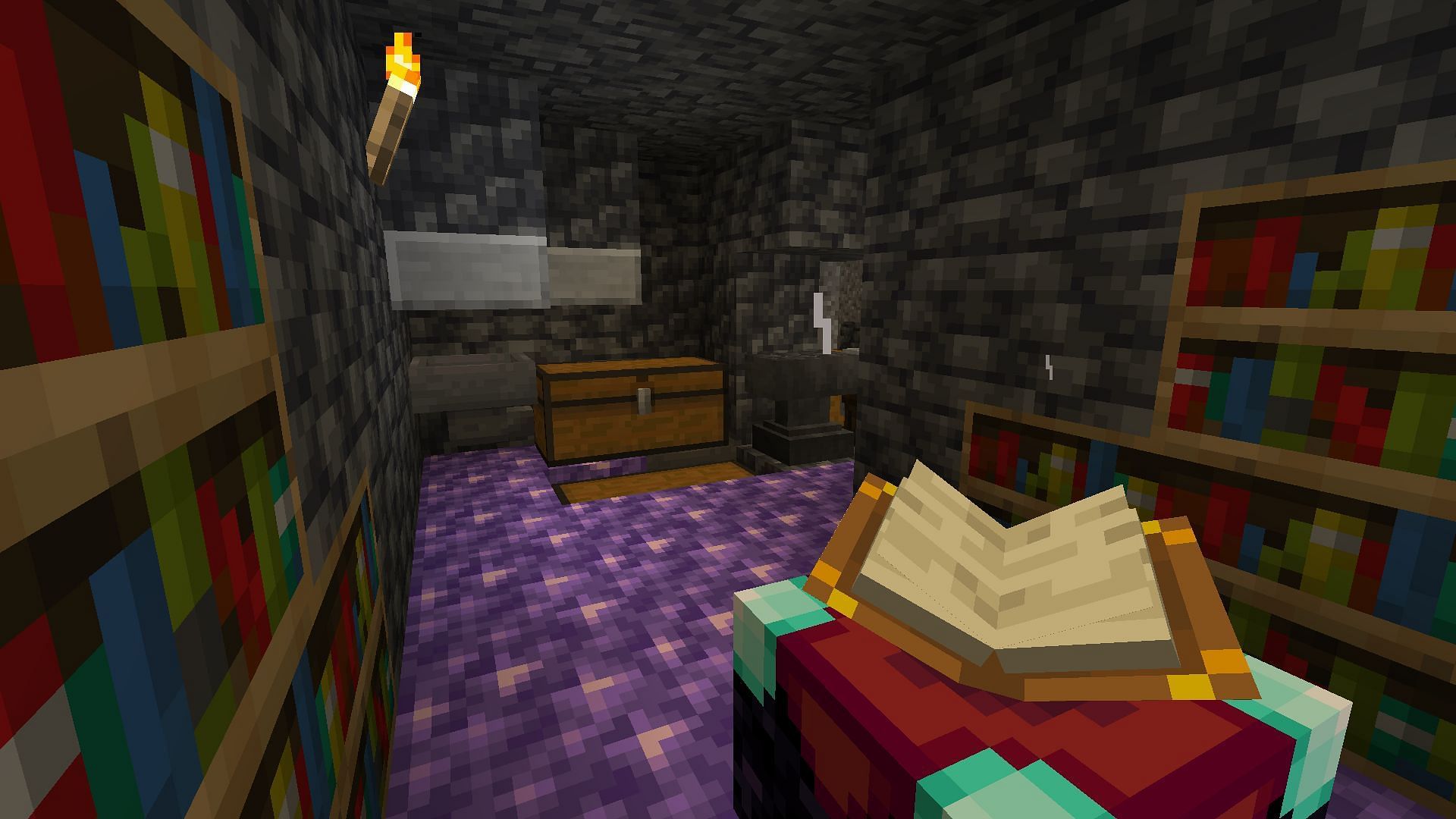 An enchanting station set up at the output of a skeleton farm (Image via Minecraft)
