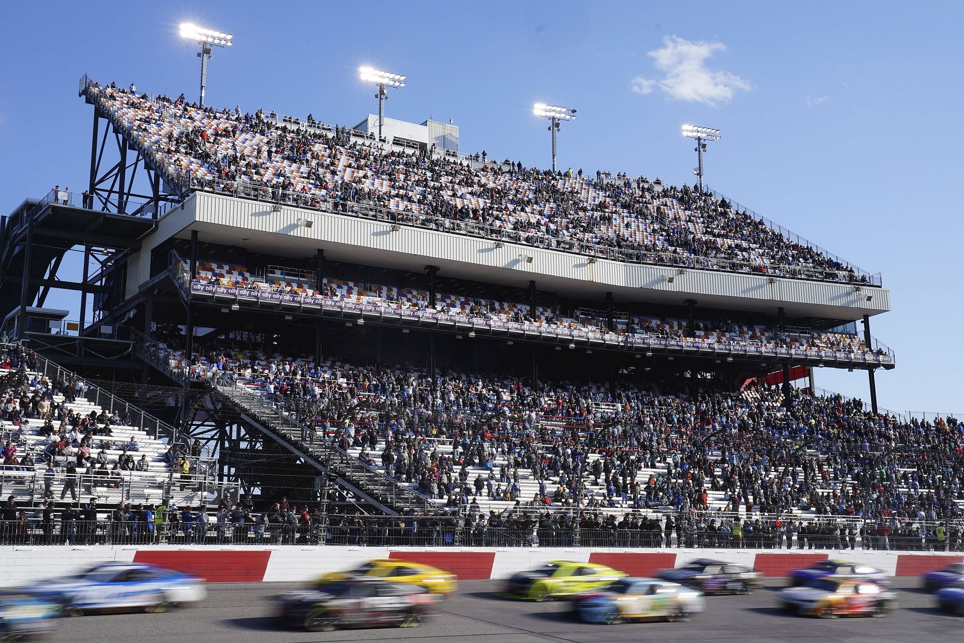 Cars fly past the grandstands during the 2022 NASCAR Cup Series Toyota Owners 400 at Richmond Raceway in Richmond, Virginia (Photo by Jacob Kupferman/Getty Images)