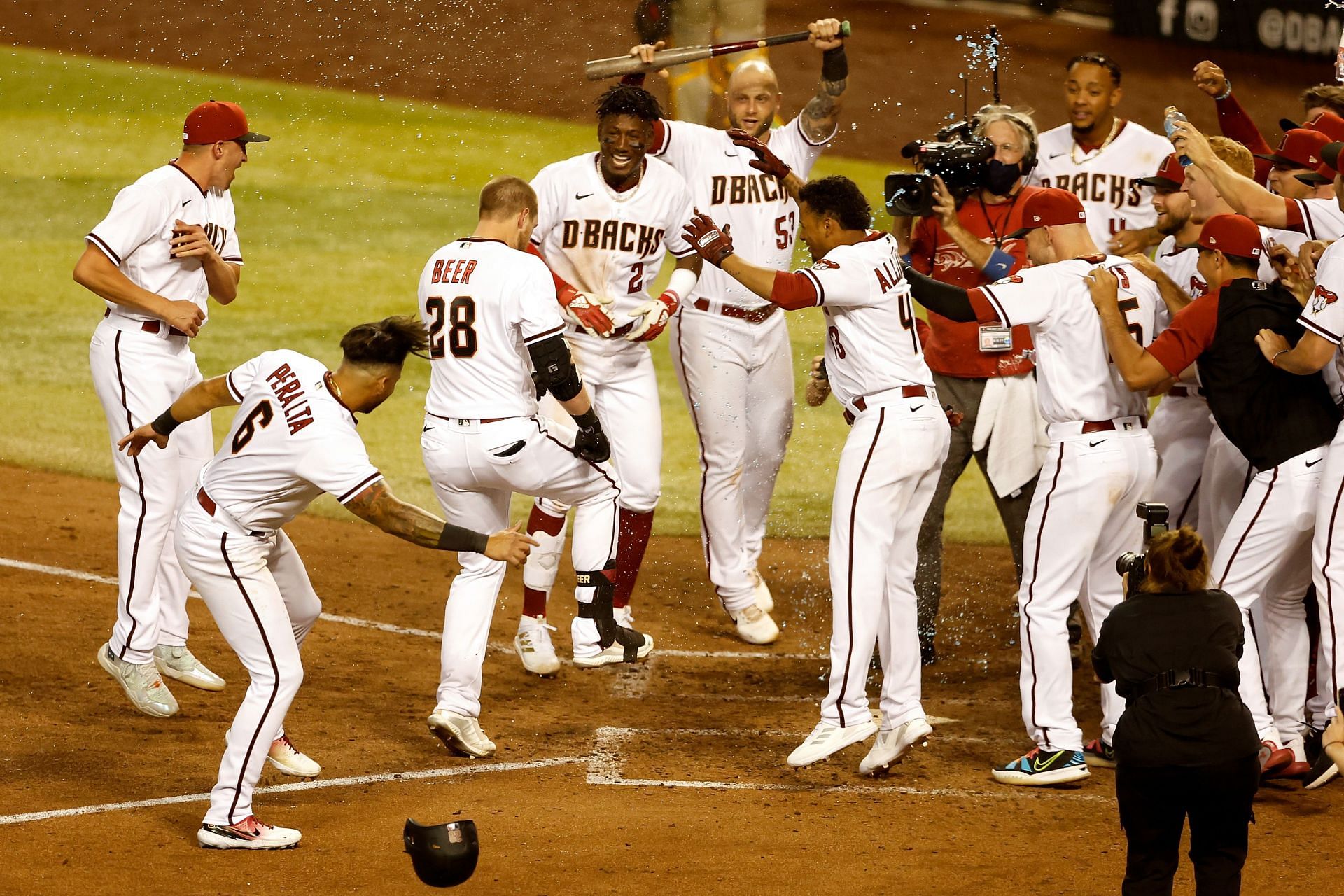 Seth Beer and the Arizona Diamondbacks celebrate his walk-off home run against the San Diego Padres