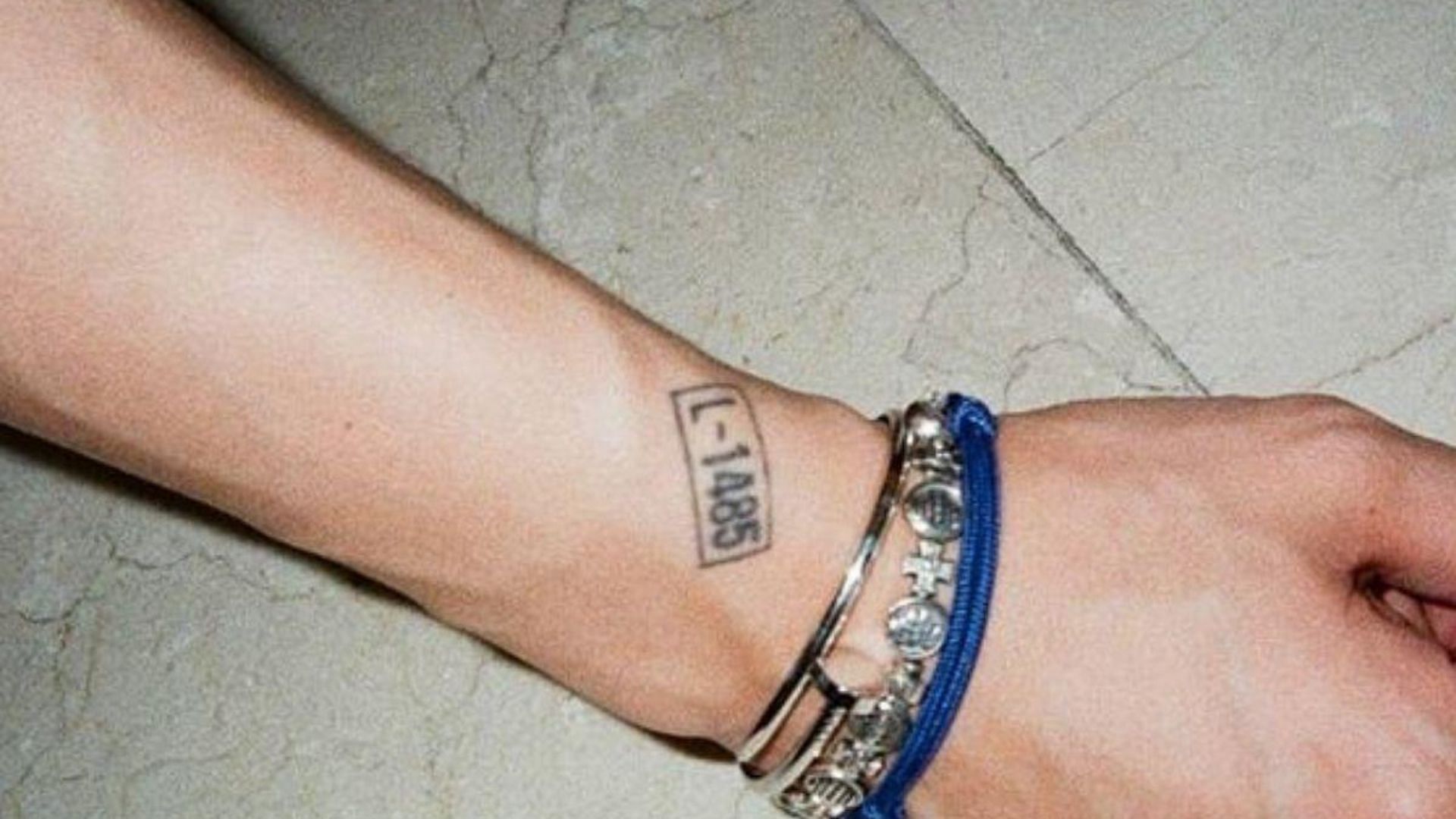 Chanyeol&#039;s &quot;L-1485&quot; tattoo (Image via @real_pcy/Instagram)