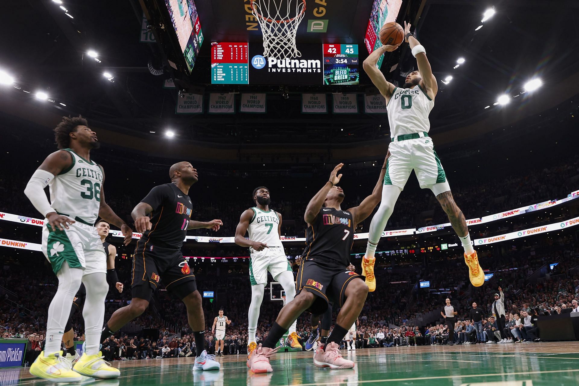 Jayson Tatum #0 of the Boston Celtics shoots over Kyle Lowry #7 of the Miami Heat