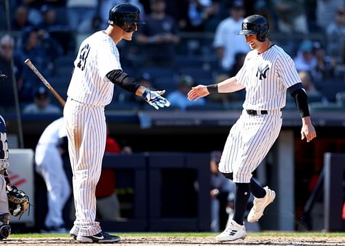 New York Yankees Anthony Rizzo (L) and Tim Locastro (R)