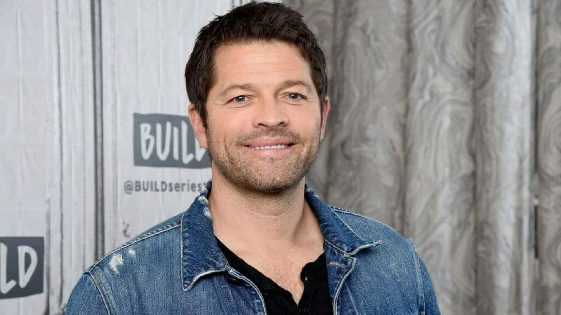 Misha Collins comes out as bisexual by mistake, leads to hilarious memes online (Image via Gary Gershoff/Getty Images)