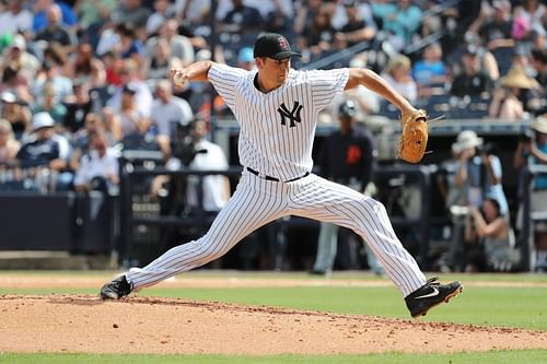 Clarke Schmidt pitches during New York Yankees minor league game