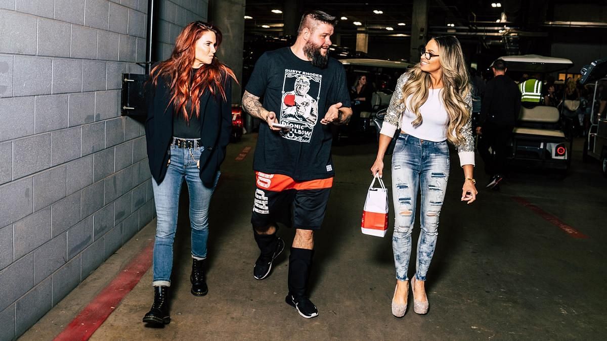 Lita, Kevin Owens, and Trish Stratus