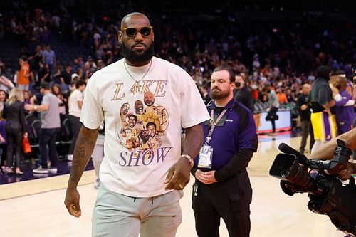 LeBron James #6 of the Los Angeles Lakers walks off the court following the NBA game against the Phoenix Suns at Footprint Center on April 05, 2022 in Phoenix, Arizona. The Suns defeated the Lakers 121-110.