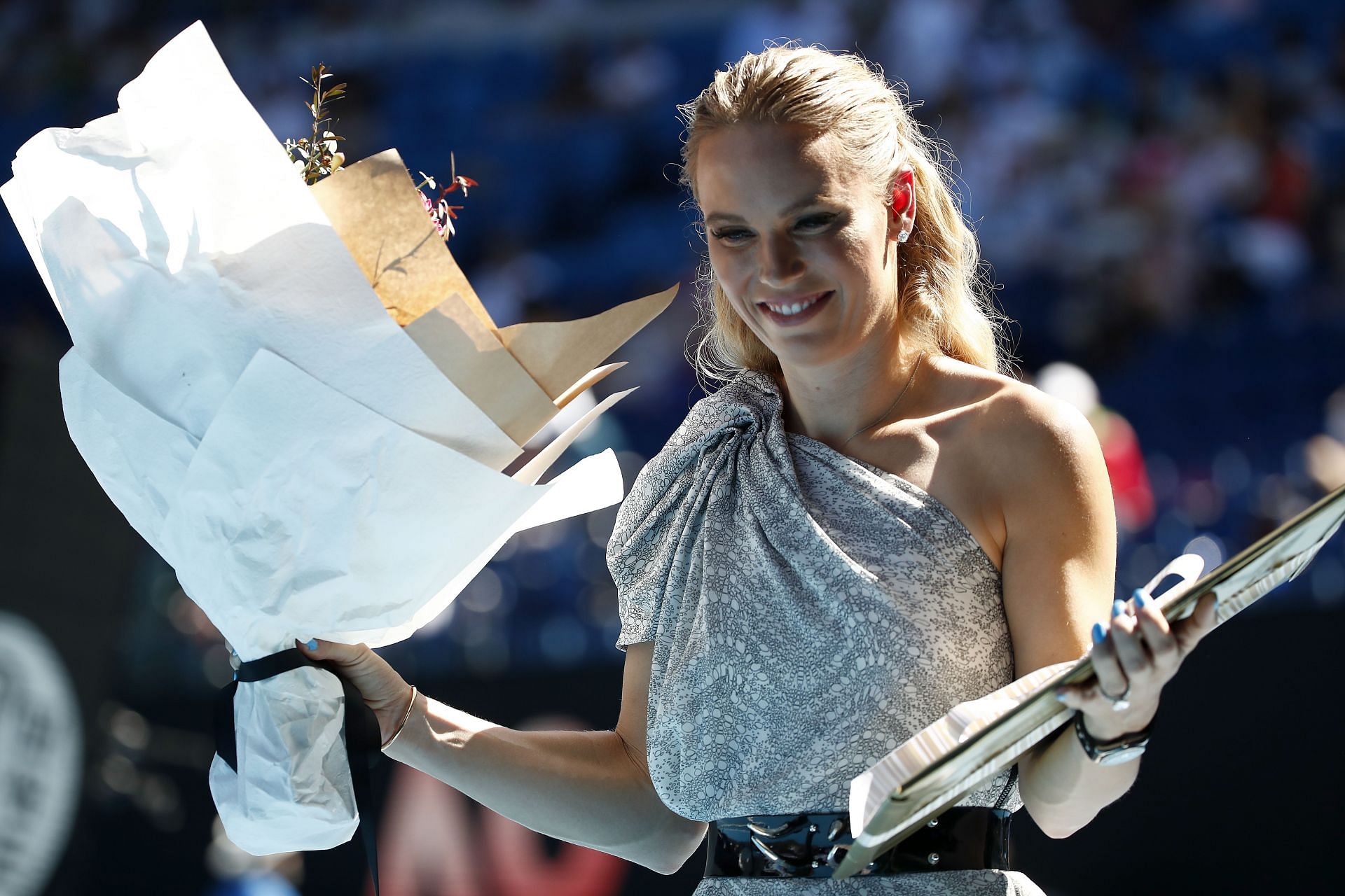 Caroline Wozniacki poses during the women&#039;s day ceremony at the 2020 Australian Open.