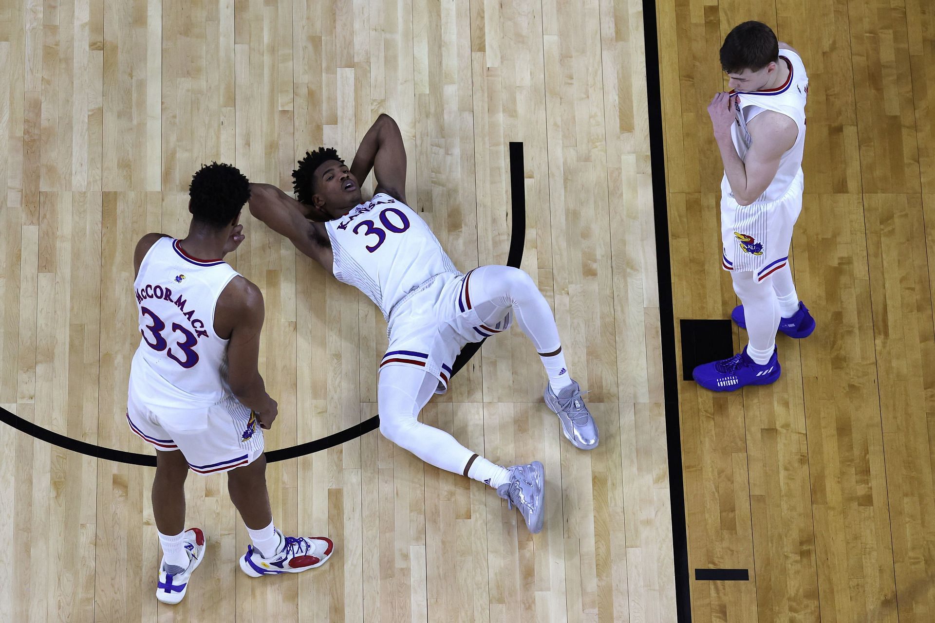 Agbaji, McCormack, and Christian Brain during the Jayhawks&#039; win in the Final Four.