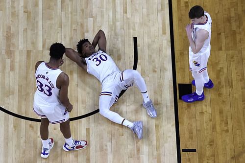 Agbaji, McCormack, and Christian Brain during the Jayhawks' win in the Final Four.