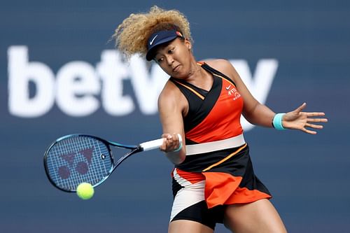 Naomi Osaka slaps a forehand in her Miami Open semifinal battle against Belinda Bencic