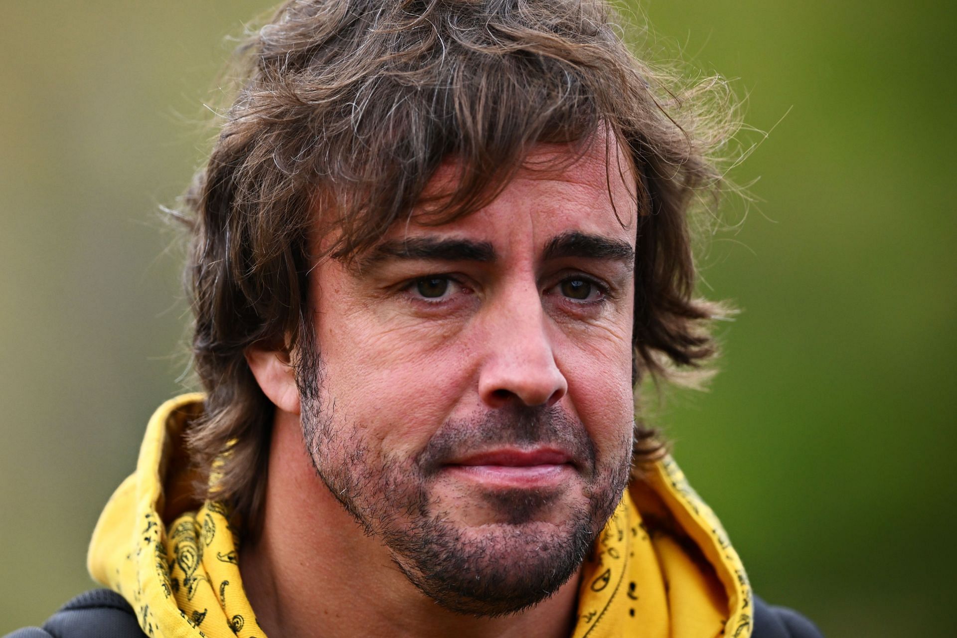 Fernando Alonso of Spain and Alpine F1 walks in the Paddock during previews ahead of the F1 Grand Prix of Emilia Romagna at Autodromo Enzo e Dino Ferrari on April 21, 2022 in Imola, Italy. (Photo by Clive Mason/Getty Images)