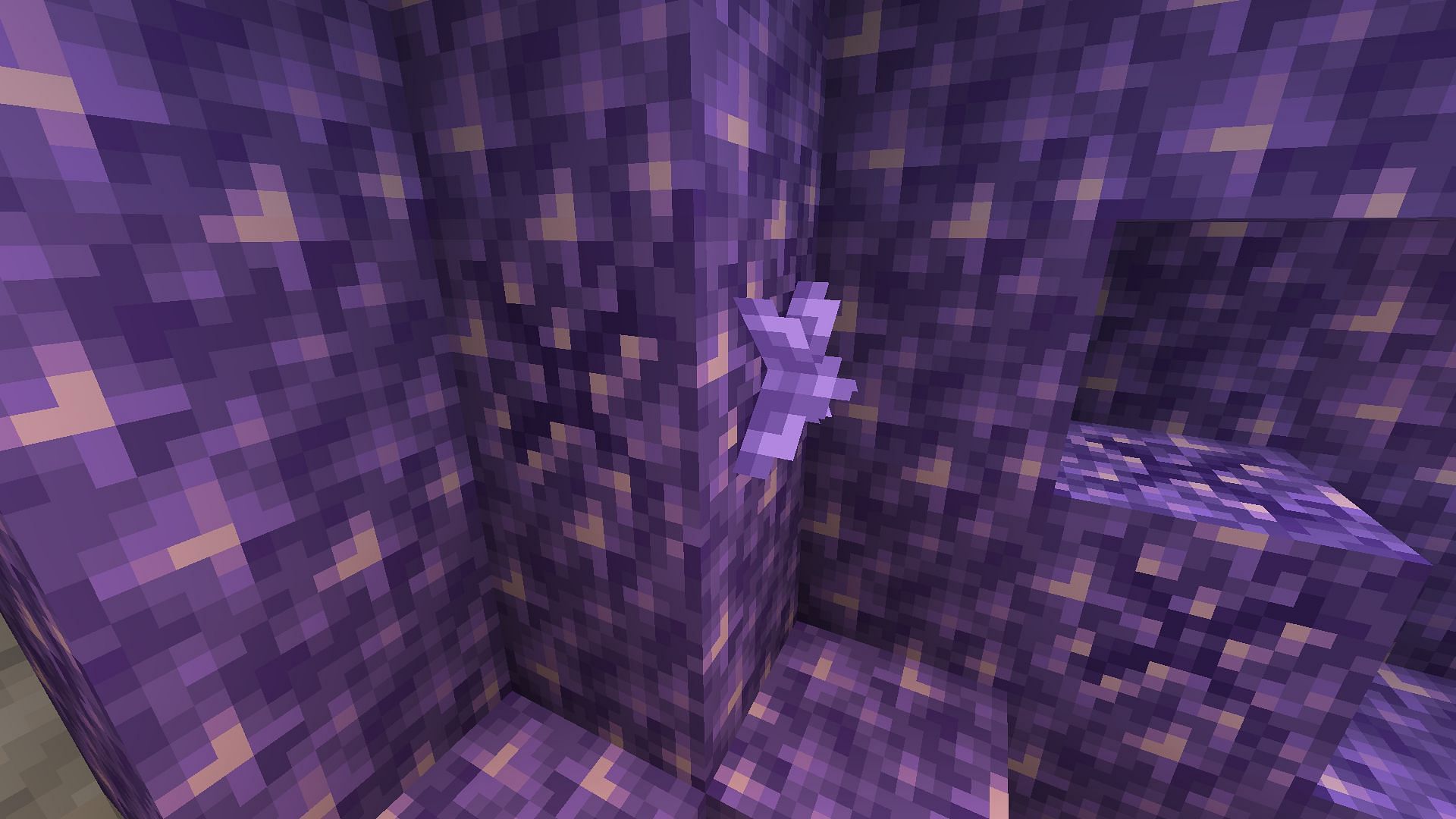 A budding amethyst with a young shard (Image via Minecraft 1.18)