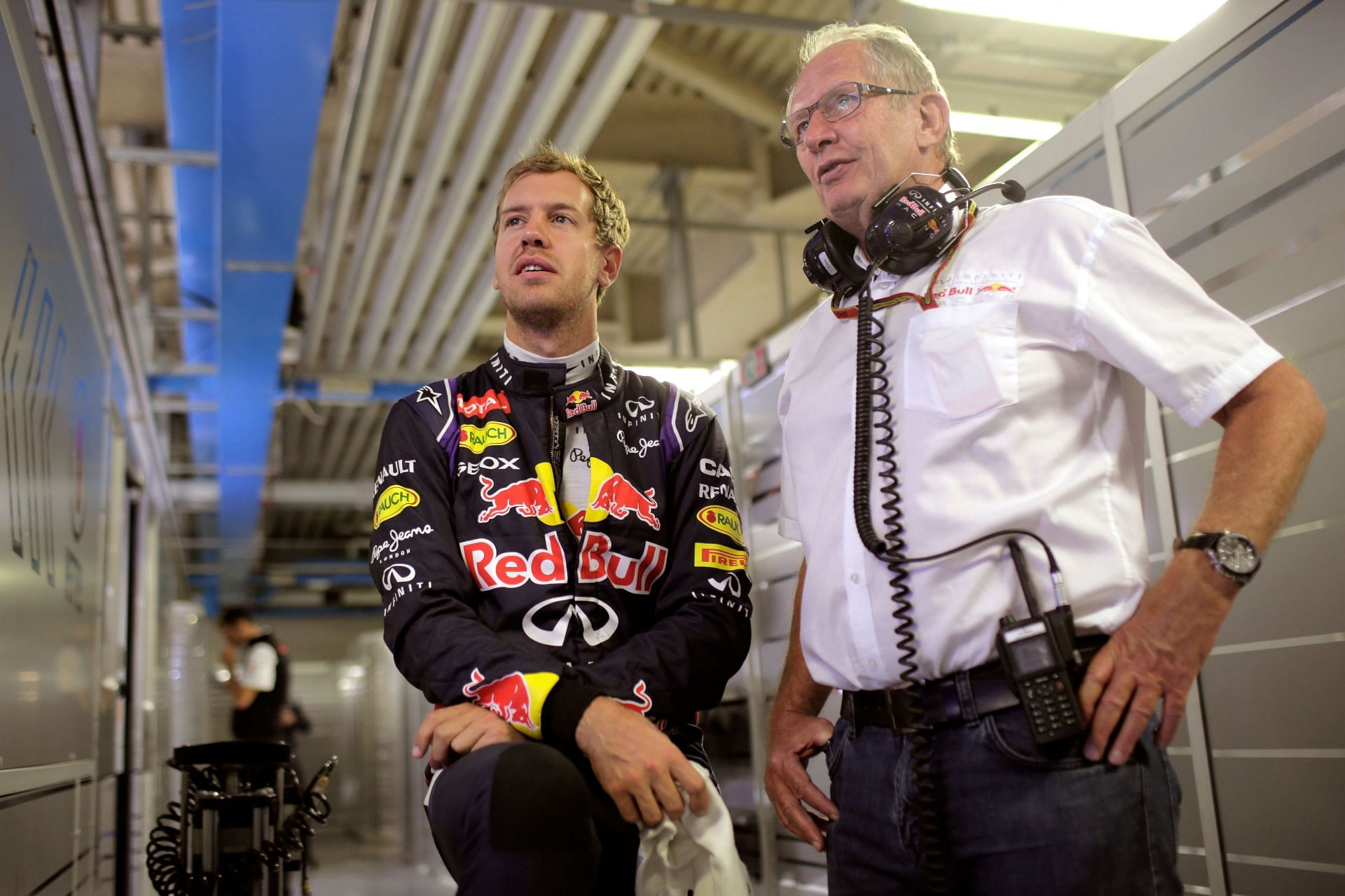 F1 Grand Prix of Italy - Practice - Sebastian Vettel prepares with Helmut Marko.