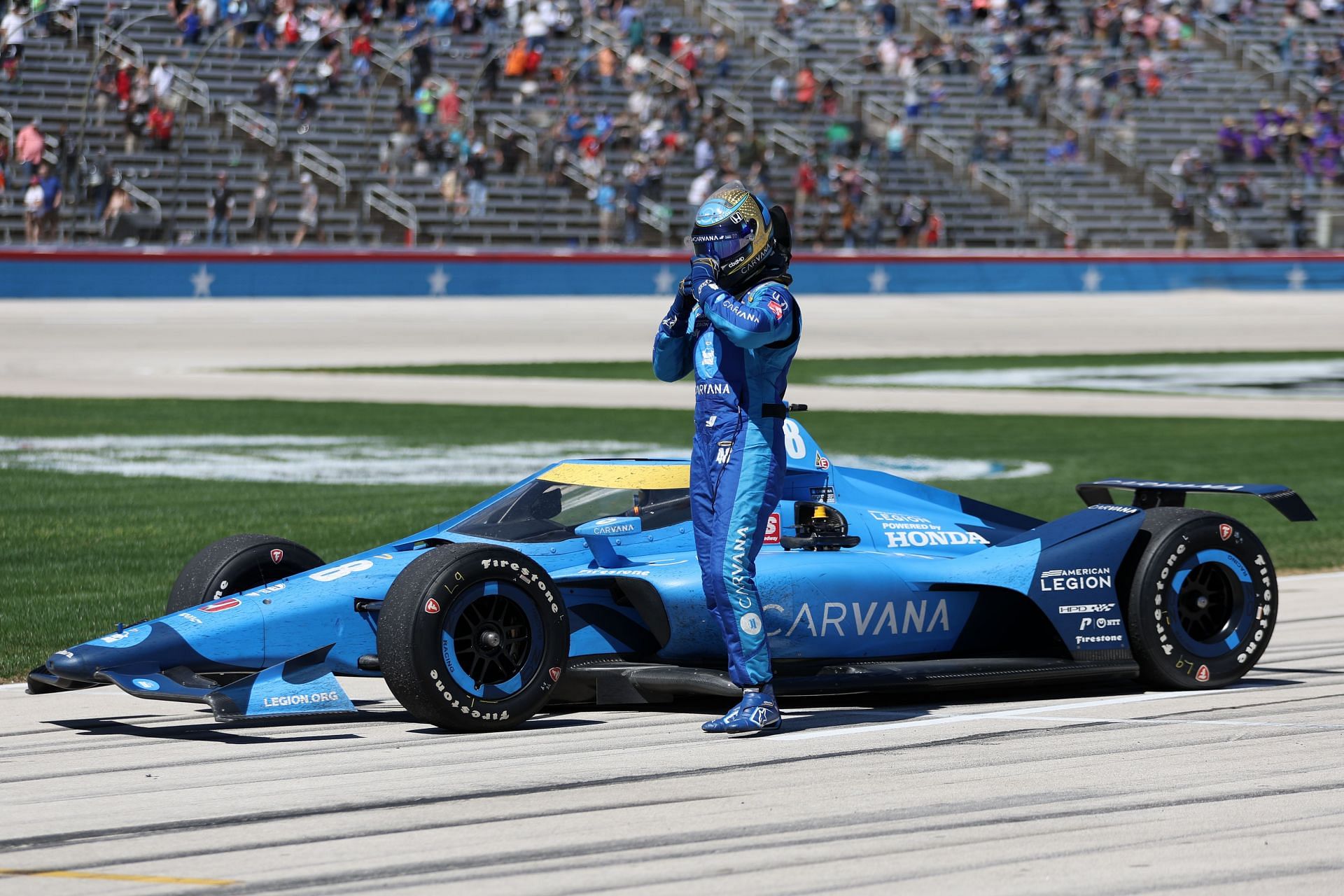 Jimmie Johnson exits his car after the NTT IndyCar Series XPEL 375 at Texas Motor Speedway. (Photo by James Gilbert/Getty Images)