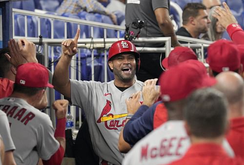 Albert Pujols celebrates with his teammates