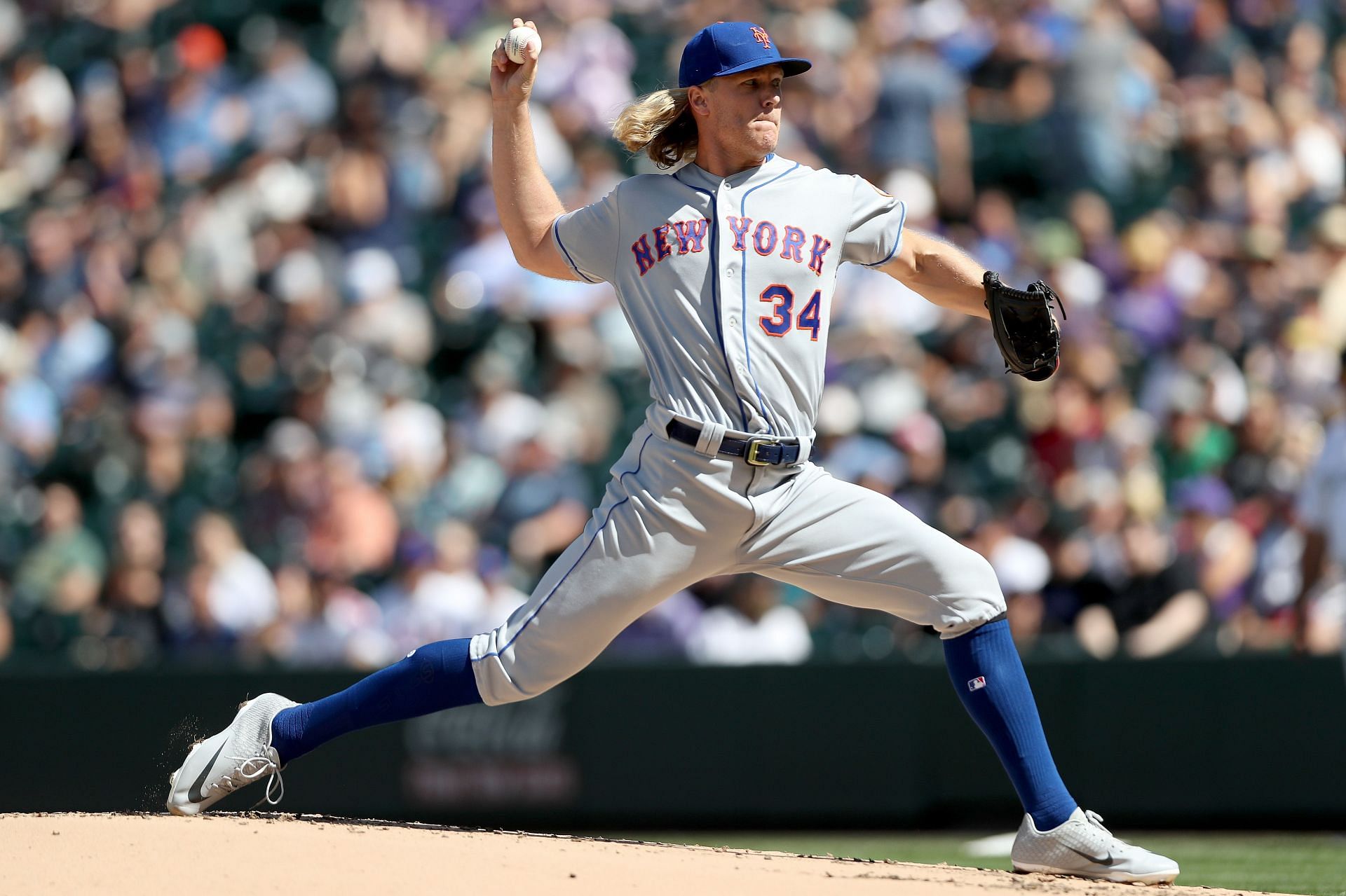 Noah Syndergaard pitches during a New York Mets v Colorado Rockies game