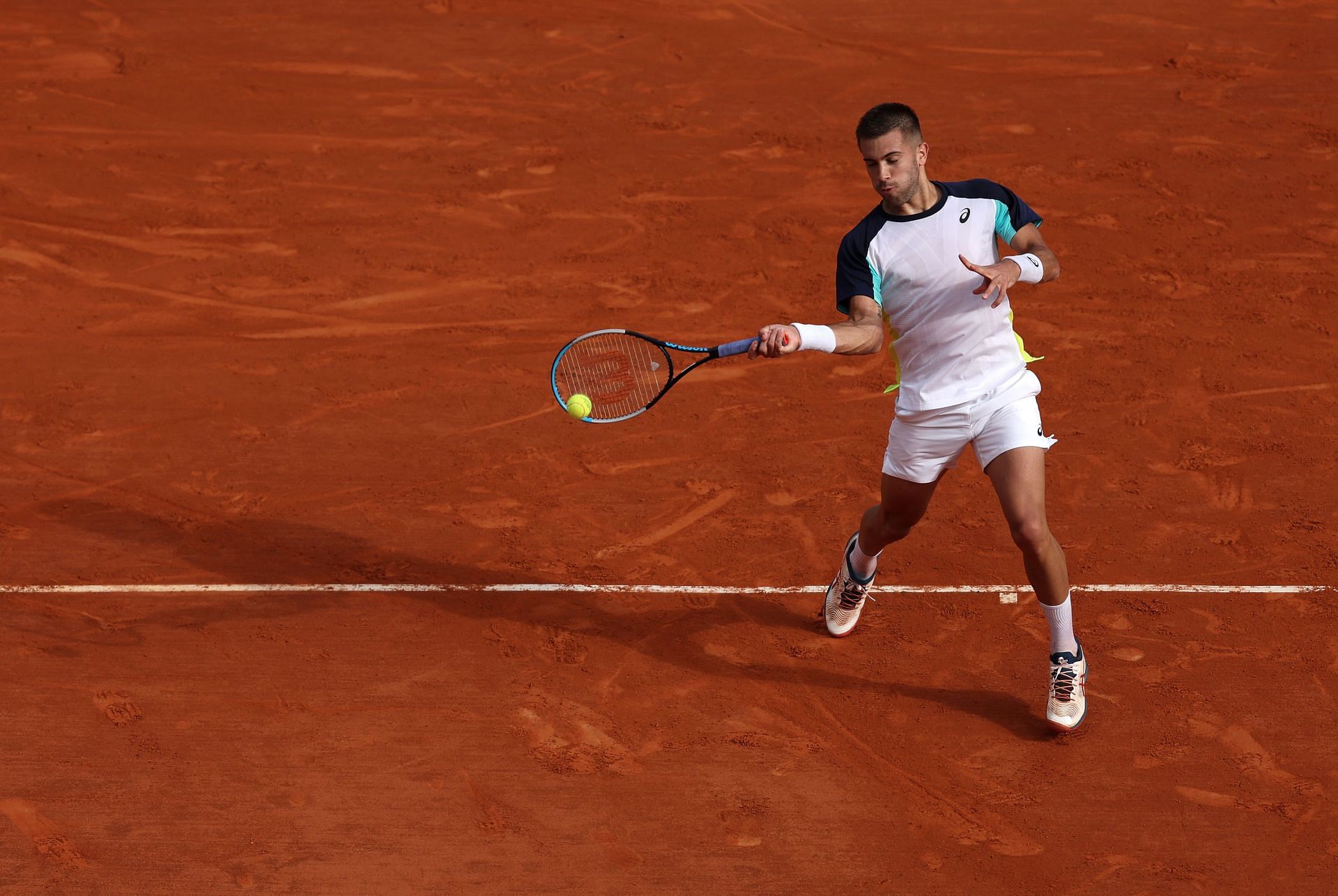 Borna Coric hits a forehand