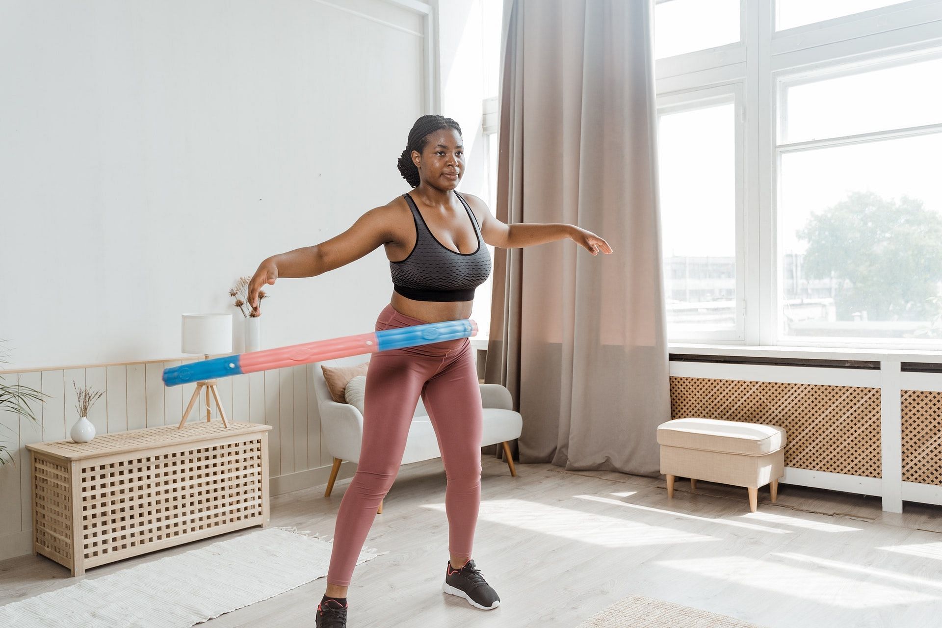 Weighted hula hooping offers some great health advantages. (Photo by MART PRODUCTION via pexels)