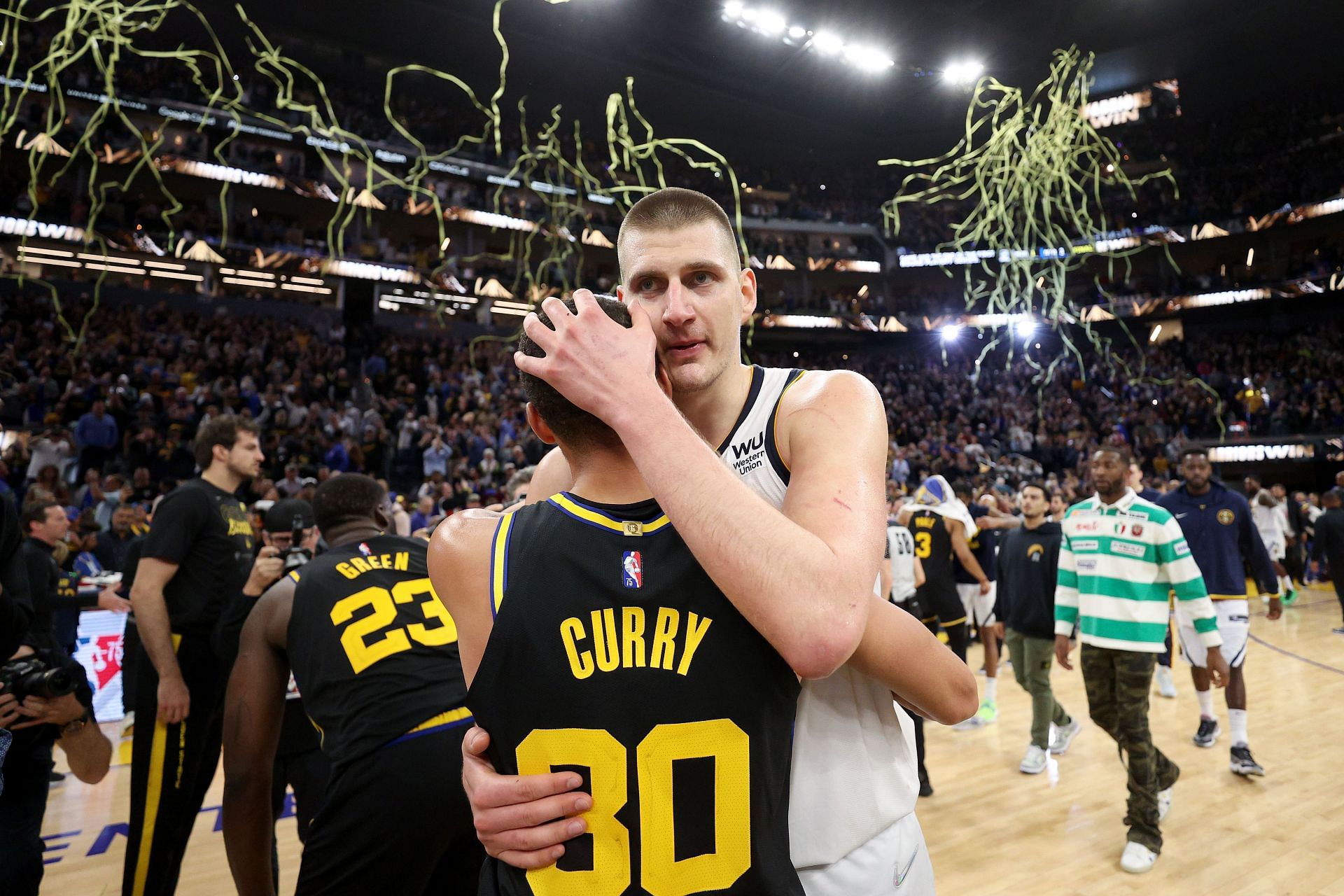 Steph Curry of the Golden State Warriors and Nikola Jokic of the Denver Nuggets