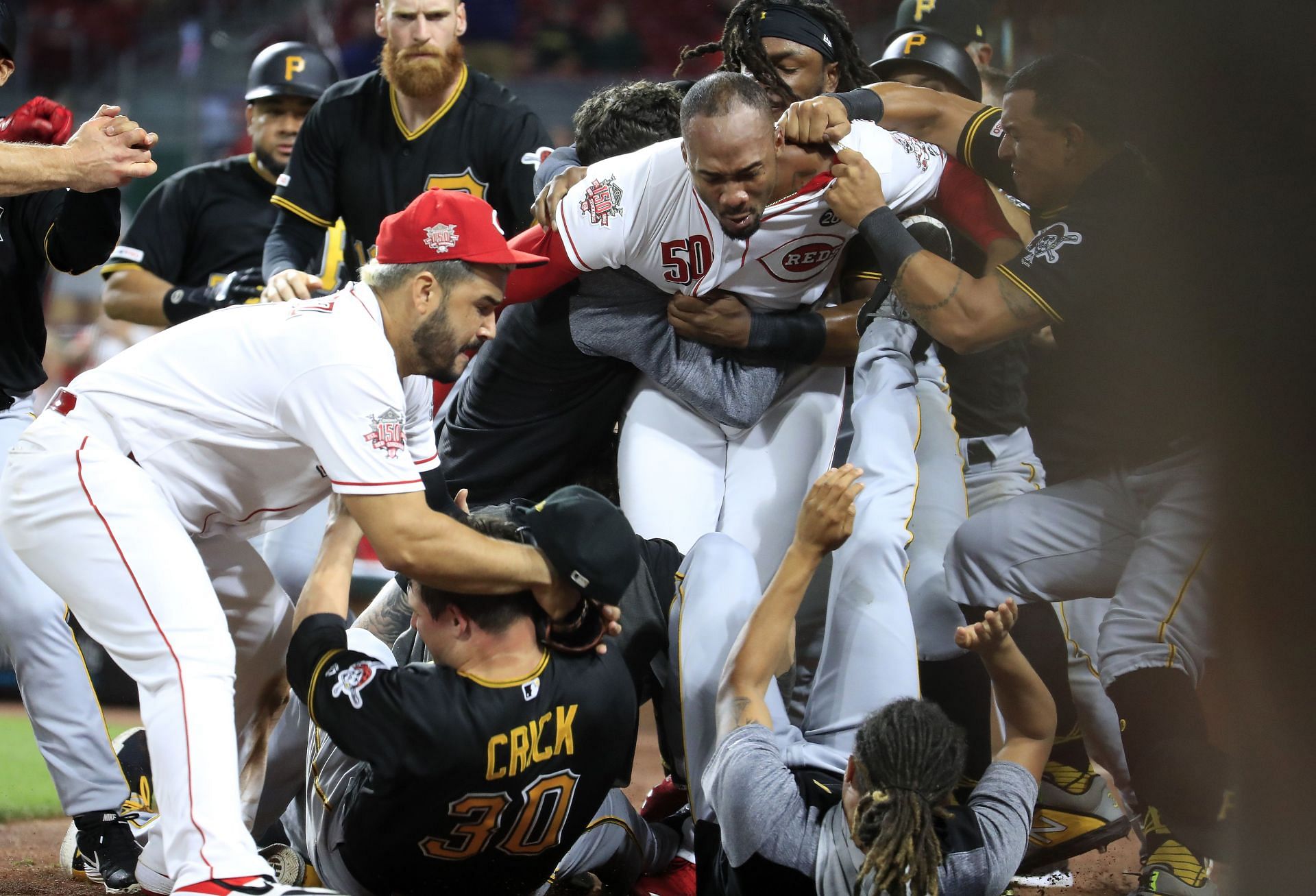 Amir Garrett trying to be restrained after picking a fight with an entire MLB team