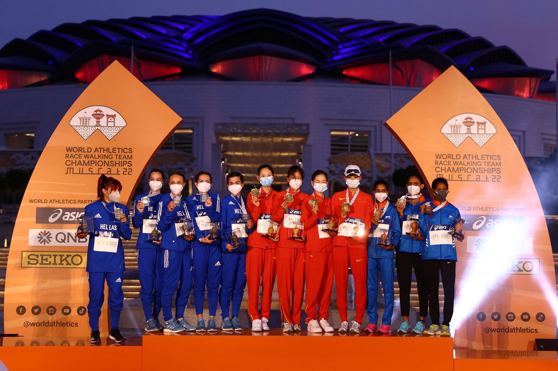 Greece (silver), China (gold) and India (bronze) during the Women&rsquo;s 20km Race Walk Team medal ceremony at the World Athletics Race Walking Team Championships in Muscat in March 2022 (Getty Images)