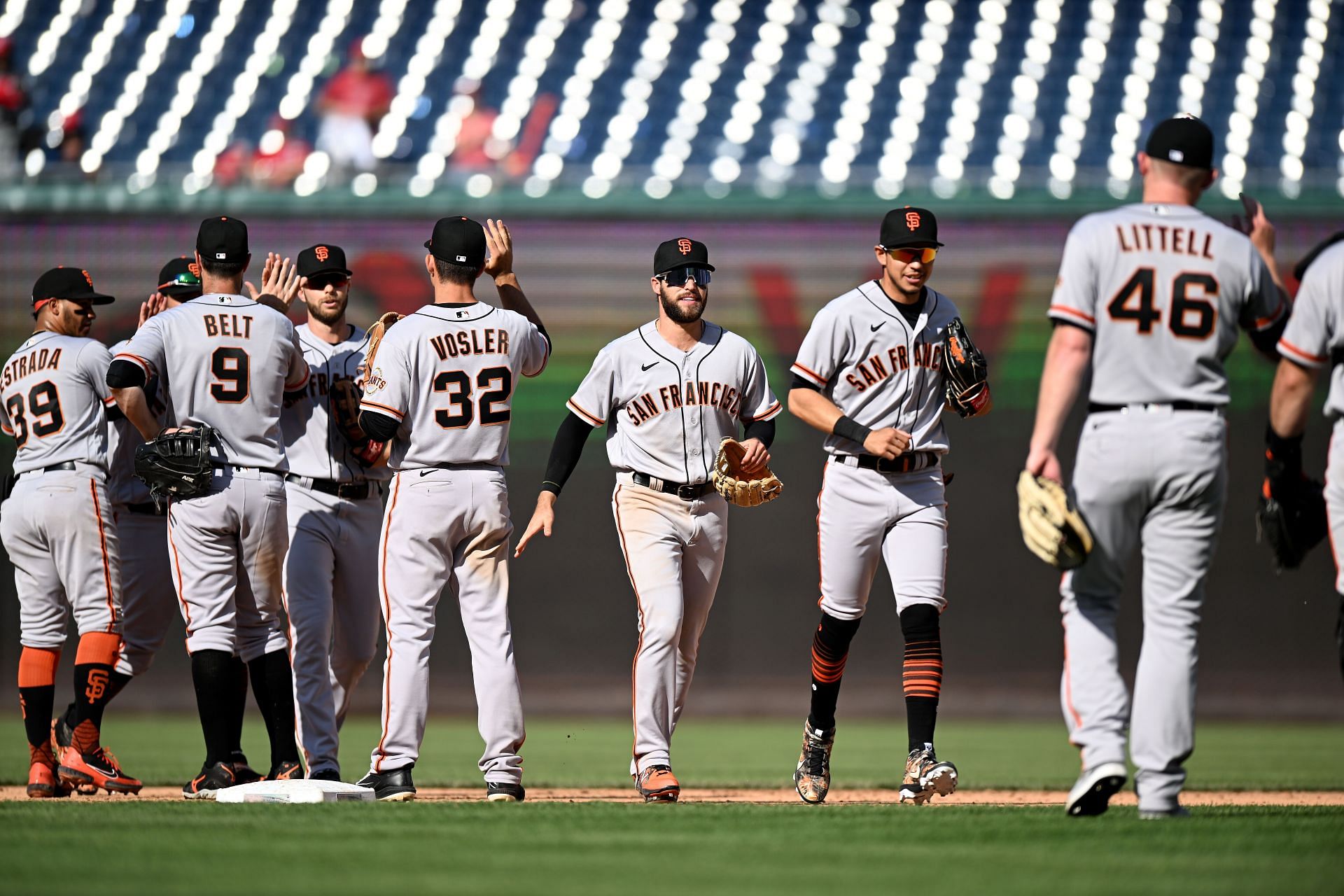 The San Francisco Giants celebrate after a 12-3 victory against the Washington Nationals