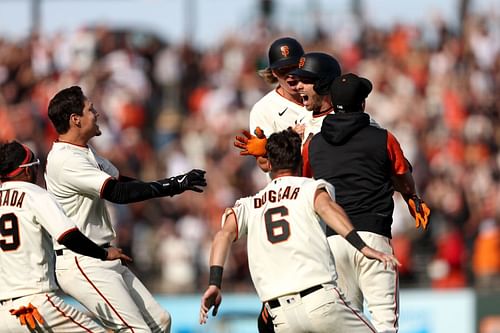 Giants players celebrate after Austin Slater's walk-off winner.