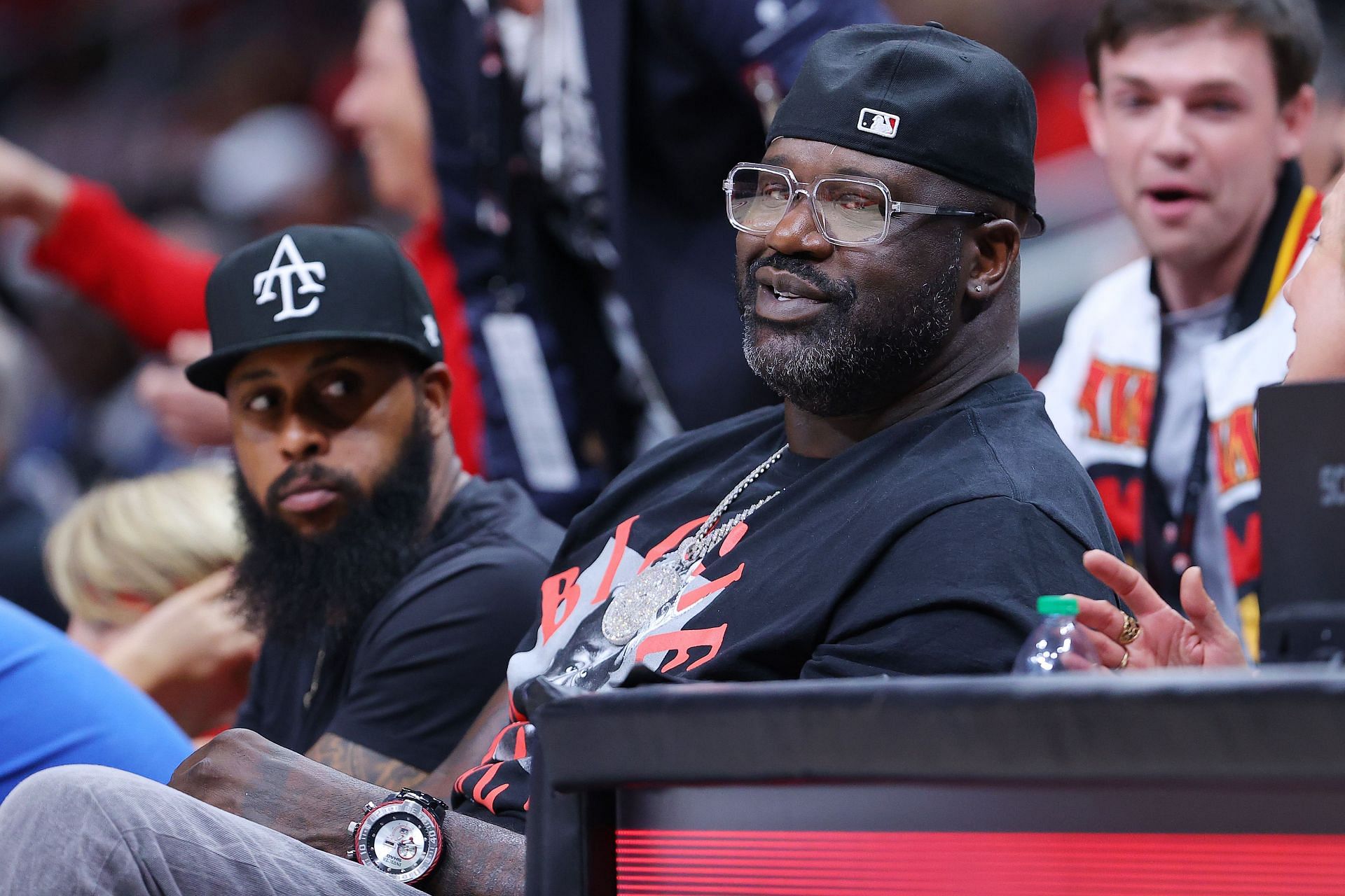 Former NBA player Shaquille O&#039;Neal looks on during the second quarter in Game Three between Miami Heat and the Atlanta Hawks