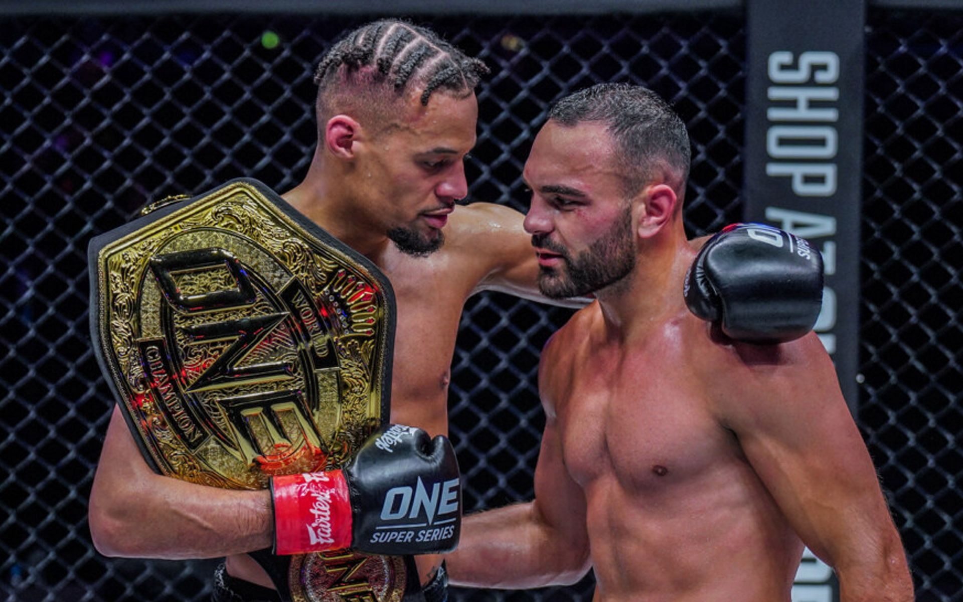 Regian Eersel (L) encourages Arian Sadikovic (R) after their bout at ONE 156.  (Photo: ONE Championship)