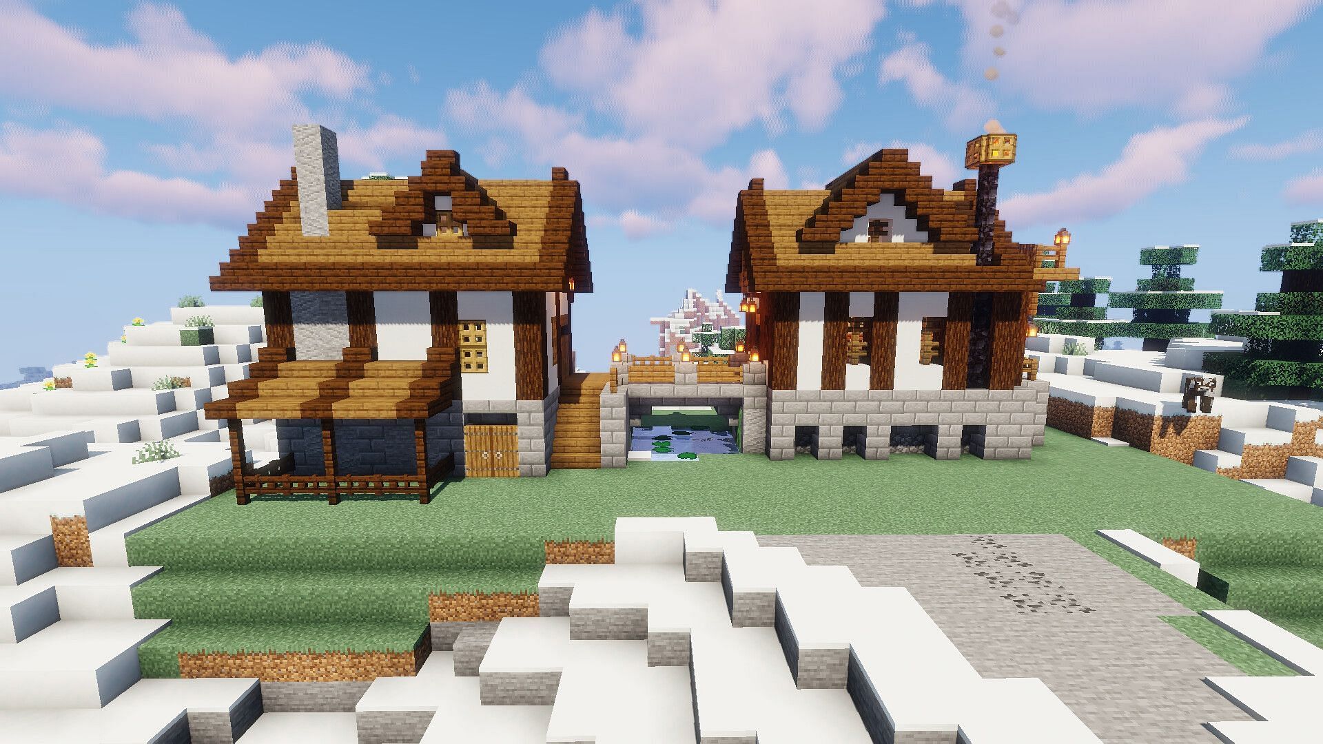 The houses of Ph1lza and Technoblade in Dream SMP (Image via Minecraft)