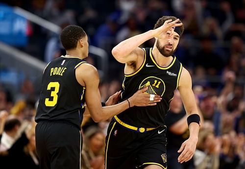 Jordan Poole and Klay Thompson in action during Denver Nuggets v Golden State Warriors - Game One