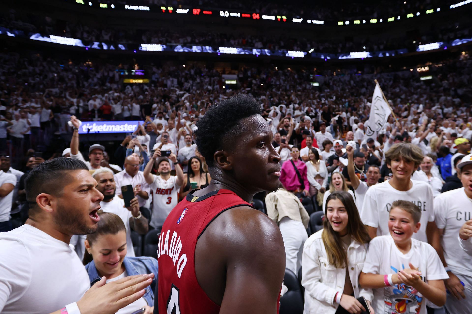 Victor Oladipo celebrates the win with the fans in Miami