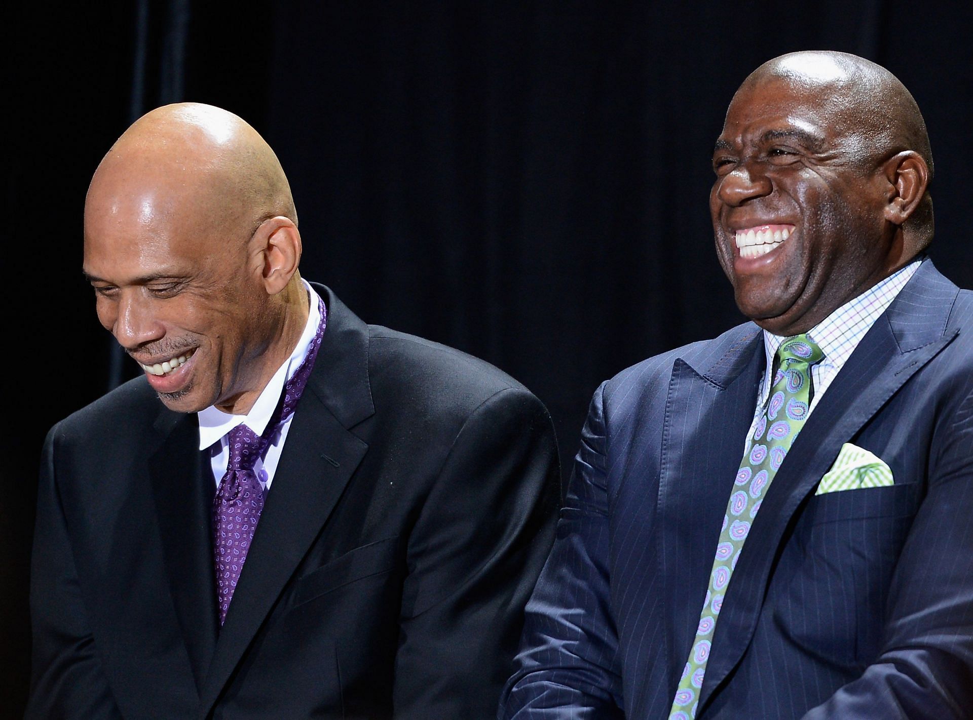 Kareem Abdul-Jabbar (L) and Magic Johnson (R) won five NBA rings for the LA Lakers in the 1980s.