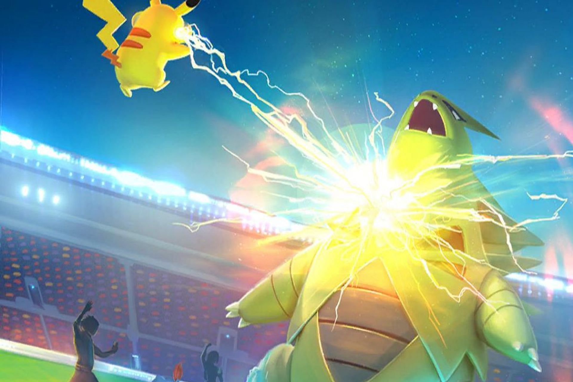 A loading screen from Pokemon GO featuring a Raid Battle (Image via Niantic)