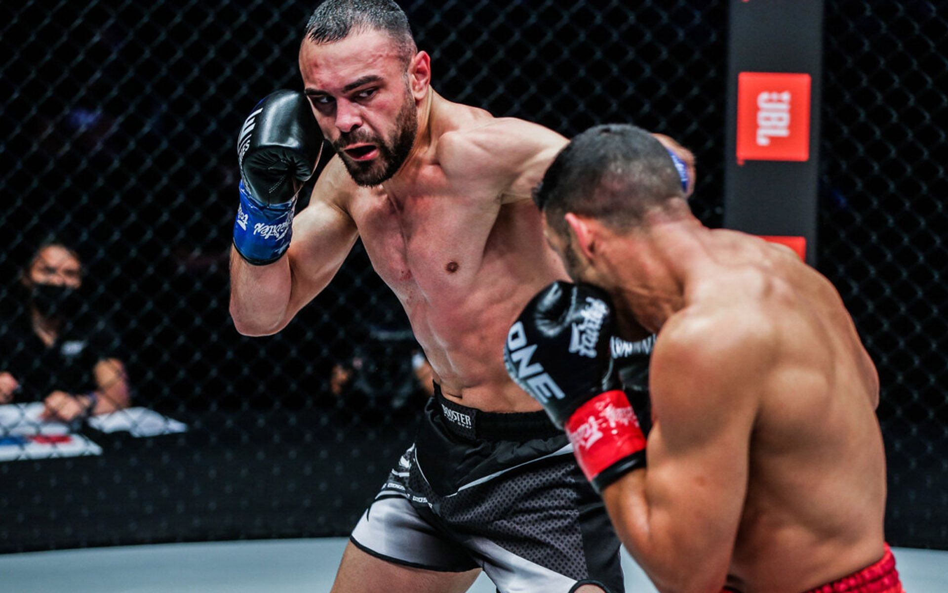 Arian Sadikovic (L) was seen working the bags like he worked Mustapha Haida (R) in his ONE Championship debut. | [Photo: ONE Championship]