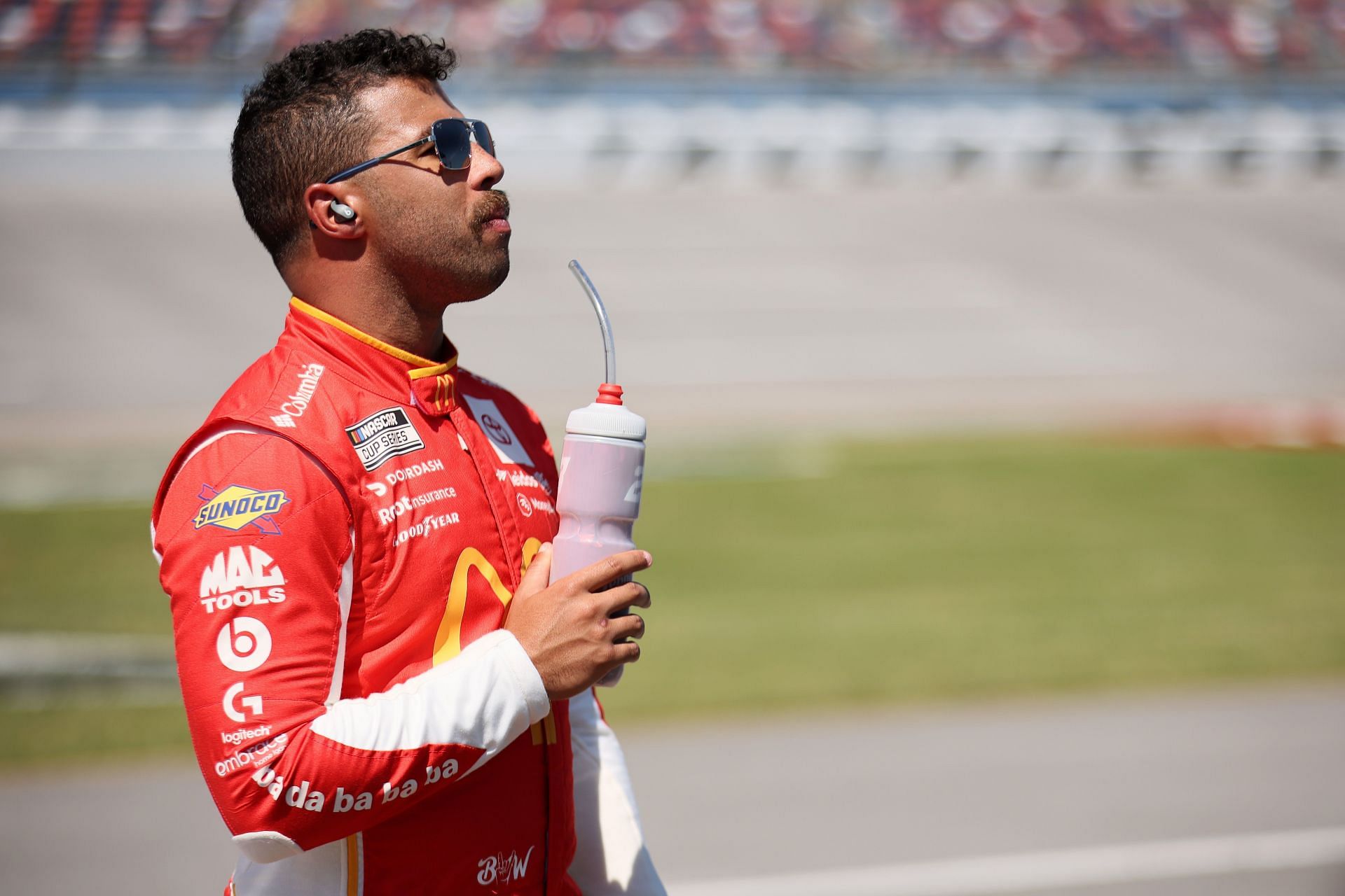 Bubba Wallace waits on the grid during qualifying for the NASCAR Cup Series GEICO 500 at Talladega Superspeedway.