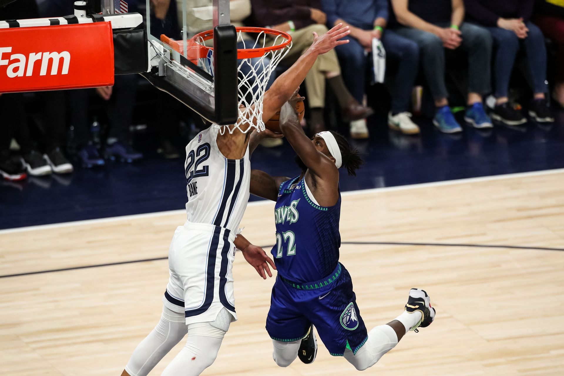 The Memphis Grizzlies' Desmond Bane blocks a shot from the Minnesota Timberwolves' Patrick Beverley