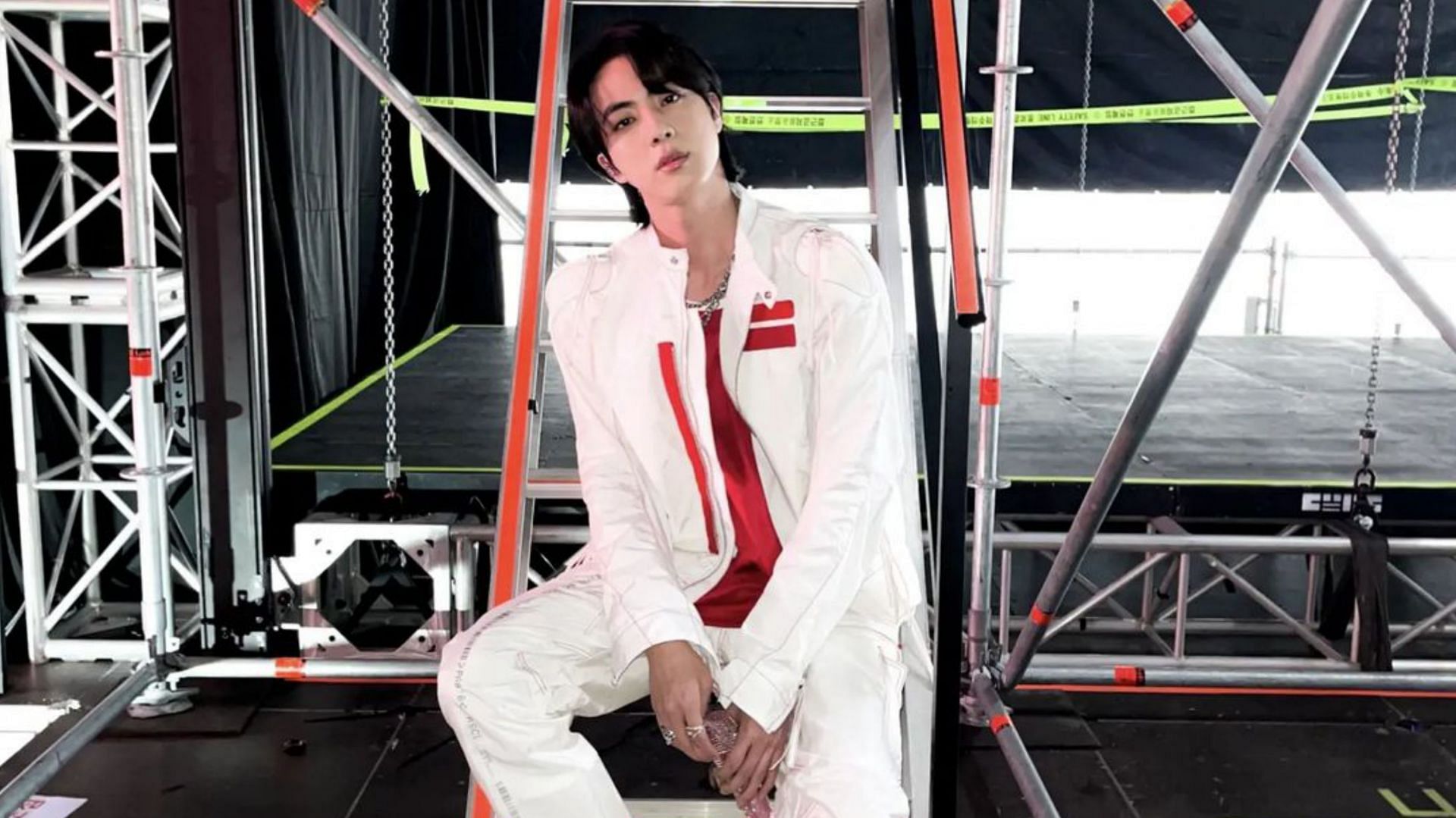 Why is Jin from BTS sitting down on a chair at PTD On Stage Las Vegas D-4?  - Quora