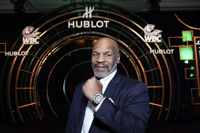 Mike Tyson recalls spending time with wild tigers - "I let them bite me"