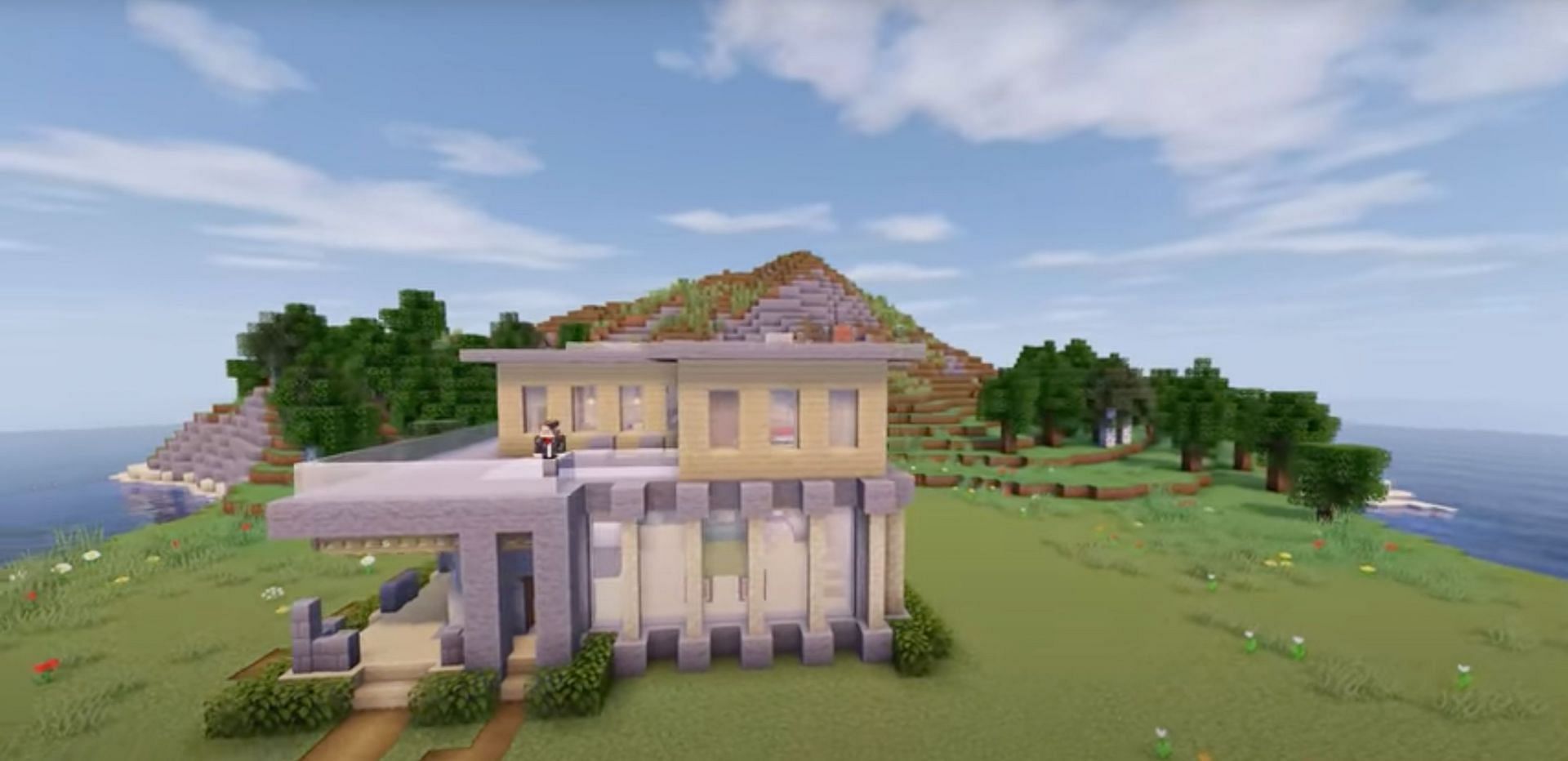 Players of Minecraft are able to create amazing looking modern builds using almost any material they can think of, including stone (Image via Greg Builds/YouTube)