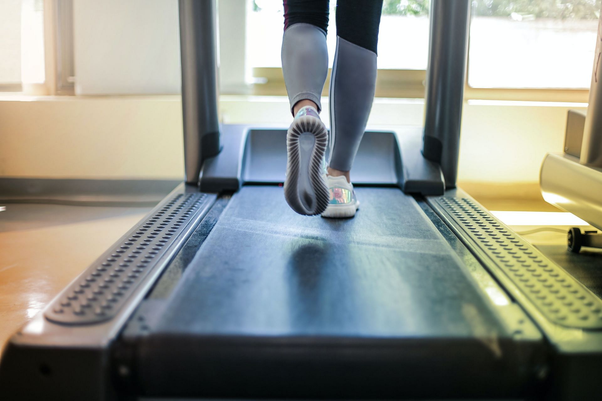 You have control on how fast or slow you would like to run on treadmill. (Image by Andrea Piacquadio / Pexels)