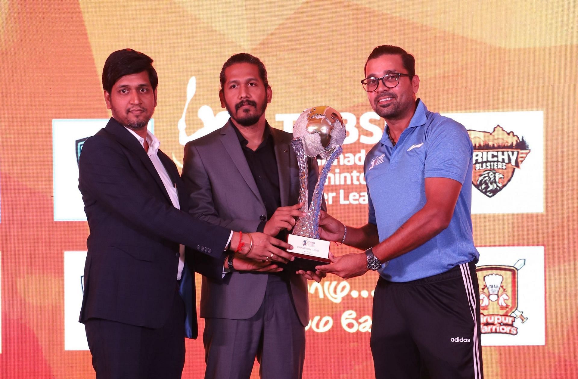 Indian cricketer Murali Vijay (right) and sponsors with the TNBSL trophy.