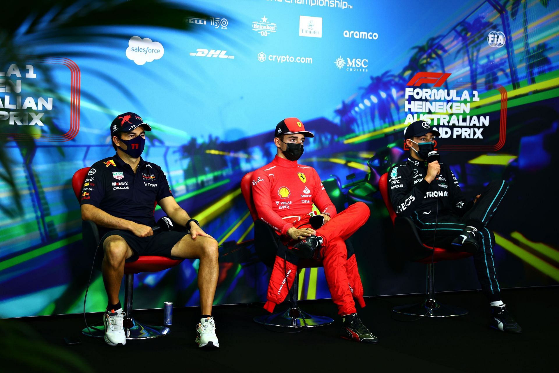 Red Bull&#039;s Sergio Perez (left), Ferrari&#039;s Charles Leclerc (center), and Mercedes&#039; George Russell (right) during the post-race press conference in Melbourne (Photo by Dan Istitene/Getty Images)