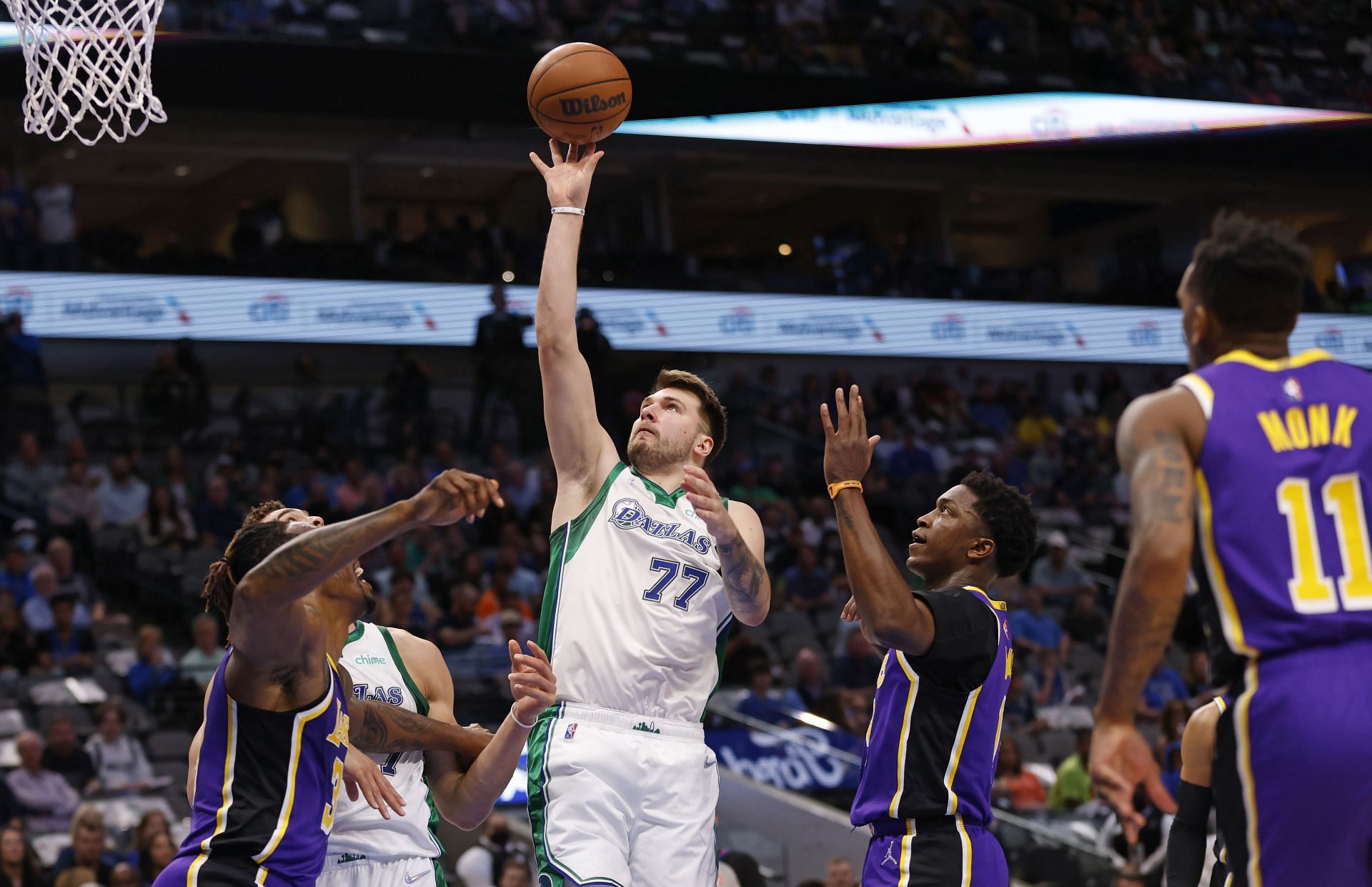 Luka Doncic attempts to score off a layup.