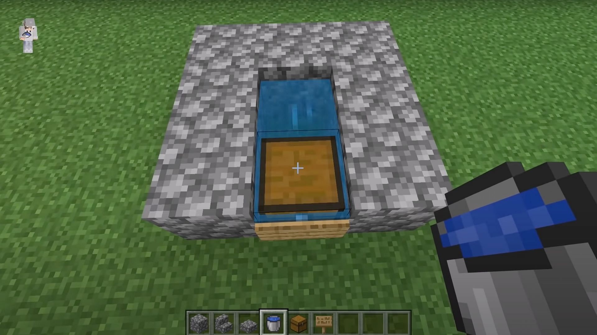 Players should add water by using the water bucket on the chest (Image via JC Playz/YouTube)