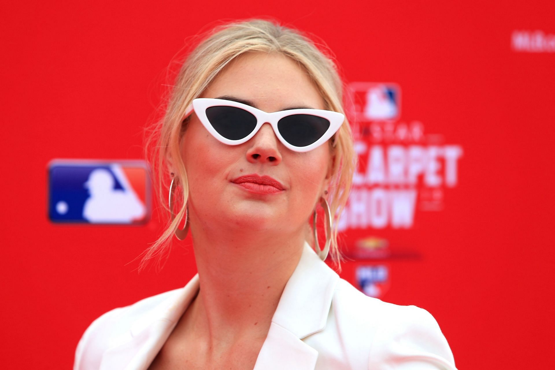 Woman covers face with lipstick at Phillies game