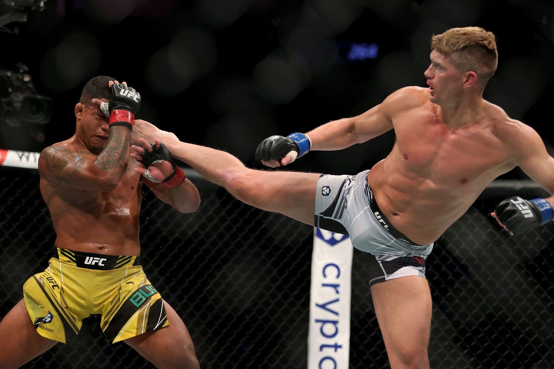 UFC 264: Stephen Thompson (right) kicking Gibert Burns in a welterweight contender fight.