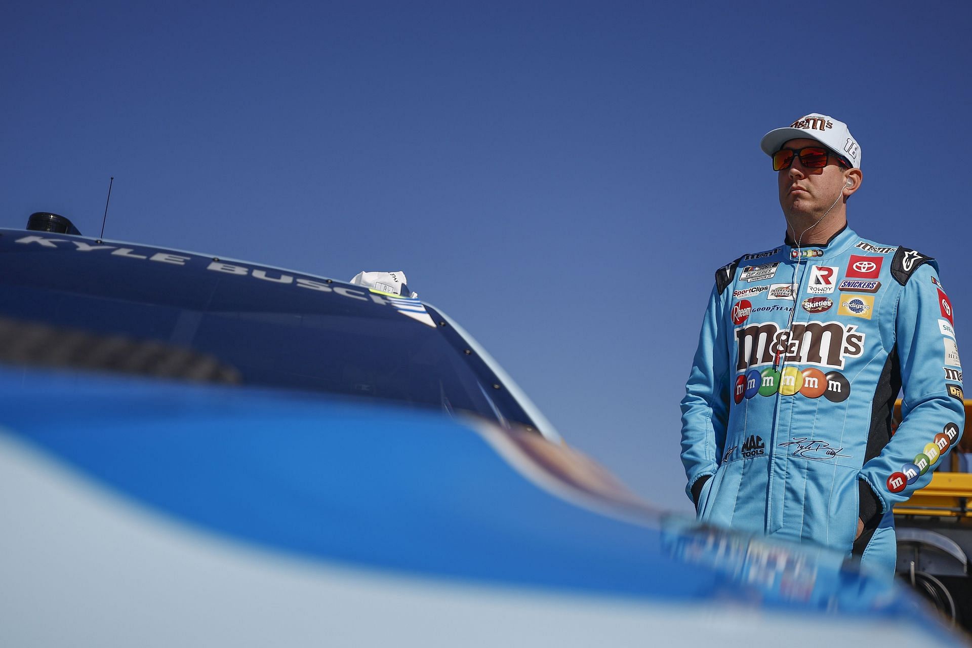 Kyle Busch waits on the grid during practice for the NASCAR Cup Series Toyota Owners 400 at Richmond Raceway.